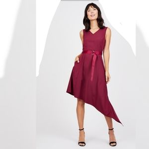 New NIIA Garnet red belted asymmetric zipper hem